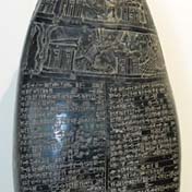Babylonian stone boundary markers begin to include inscriptions that record ownership of land.